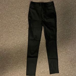 Faux leather black pants. Size Medium.